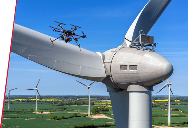 Drone Inspecting Wind Turbine