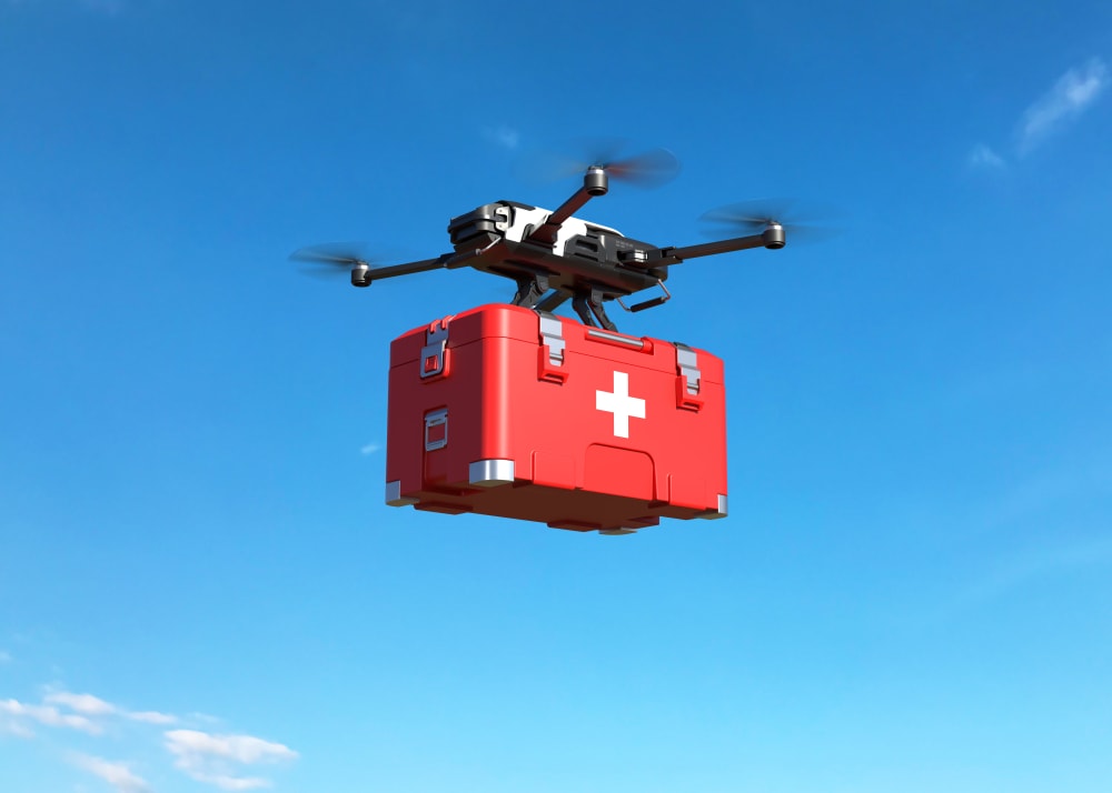 Drone carrying first aid kit on blue sky with emergency medical supplies