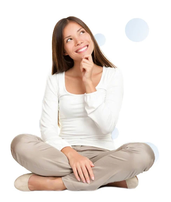 Female sitting cross legged and thinking